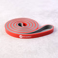 Flat resistance exercise band 2080x13 mm laid on surface