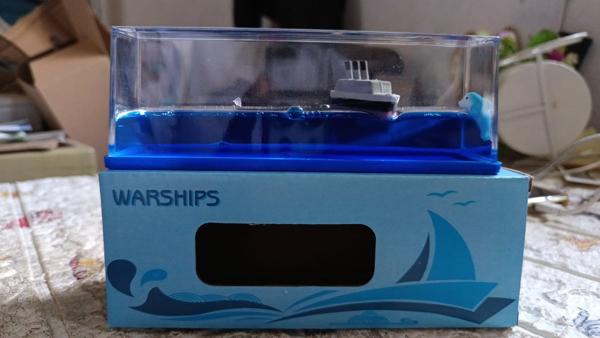 Floating Water Cruiser Ship Ornament as elegant home decor in a living room.